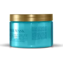 Side of the OGX Argan Oil of Morocco Hair Mask jar with directions
